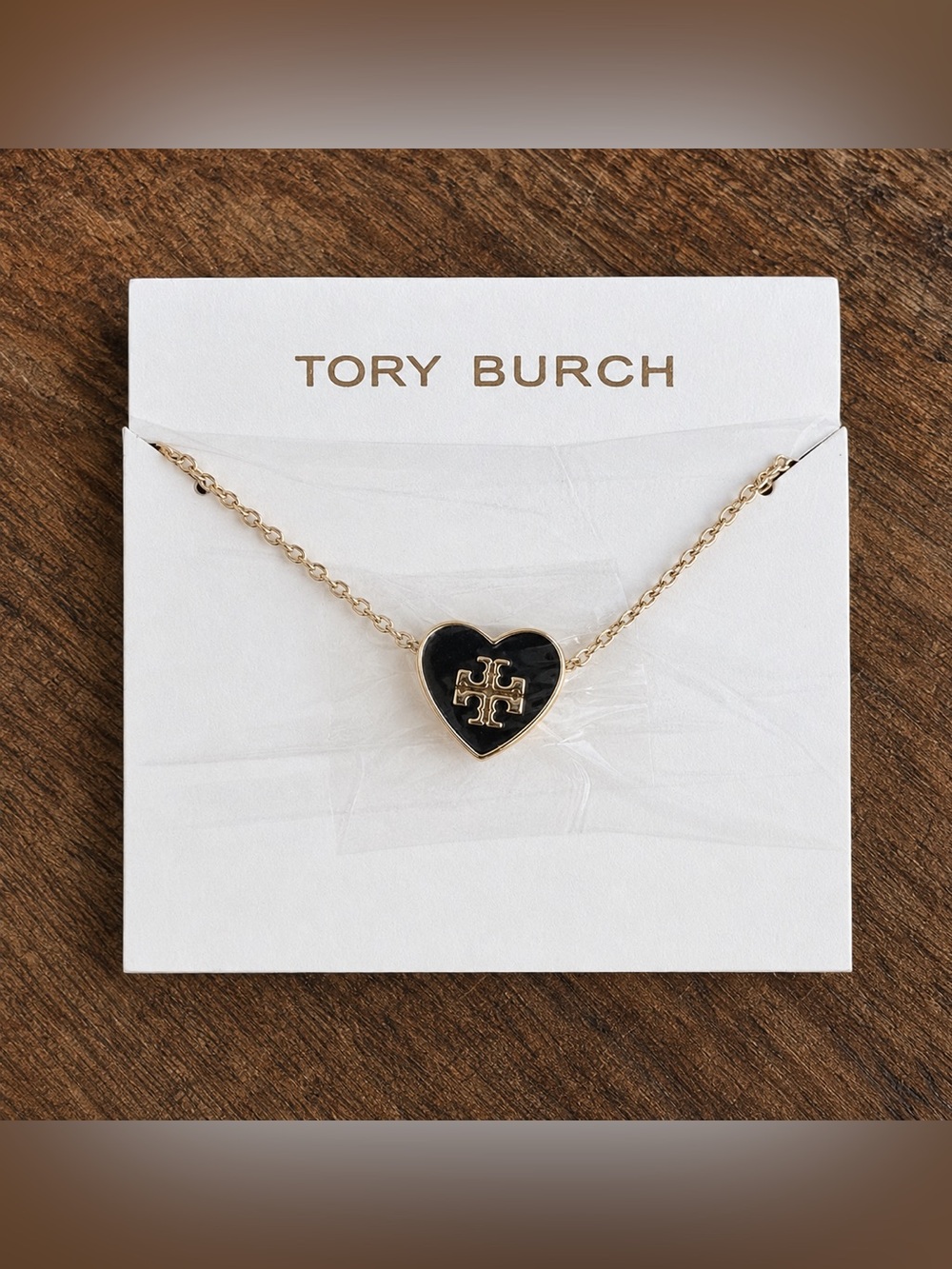 Tory Burch Black and Gold Heart Logo Necklace
